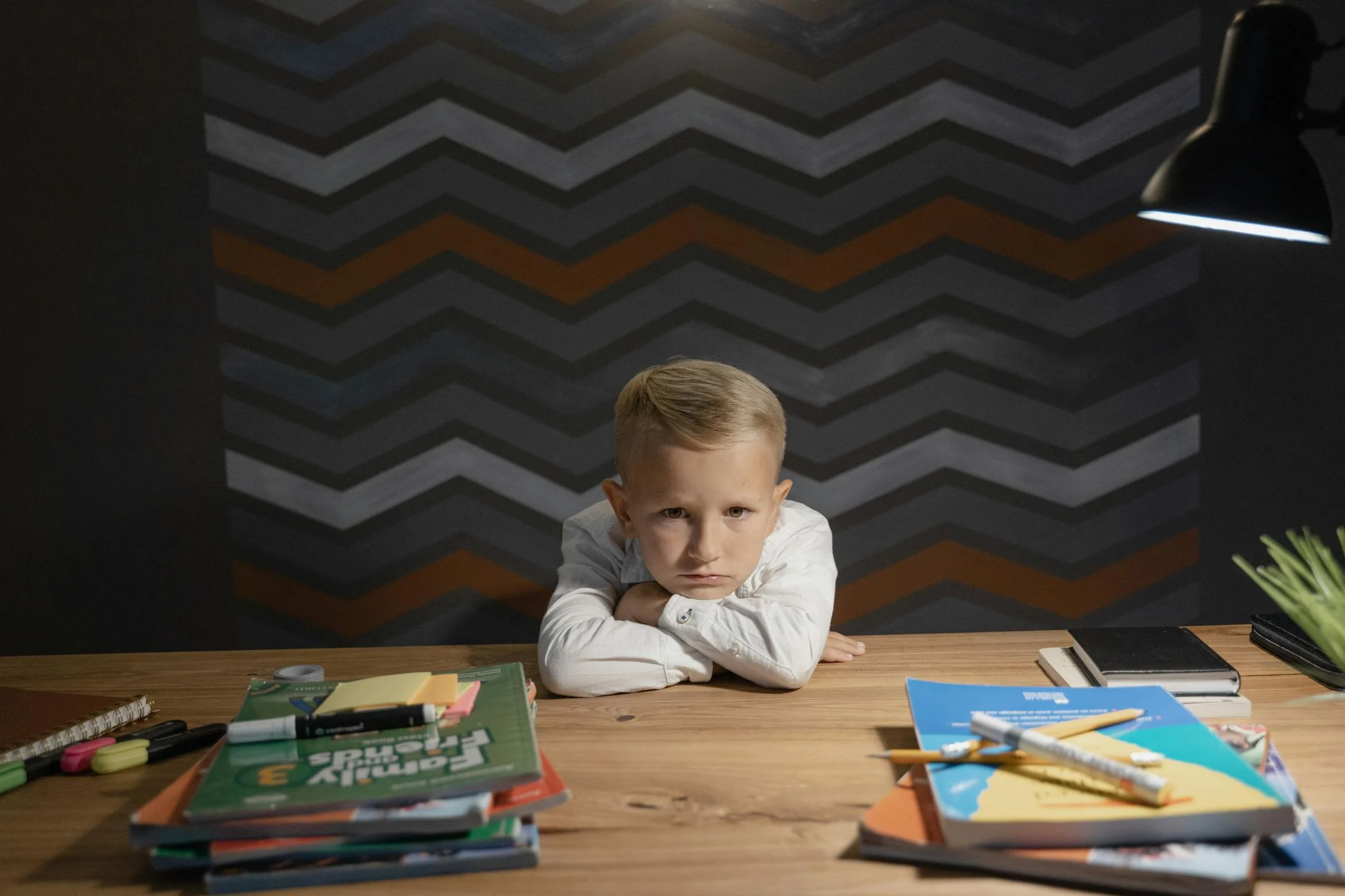 Stressed parent or educator overwhelmed with papers